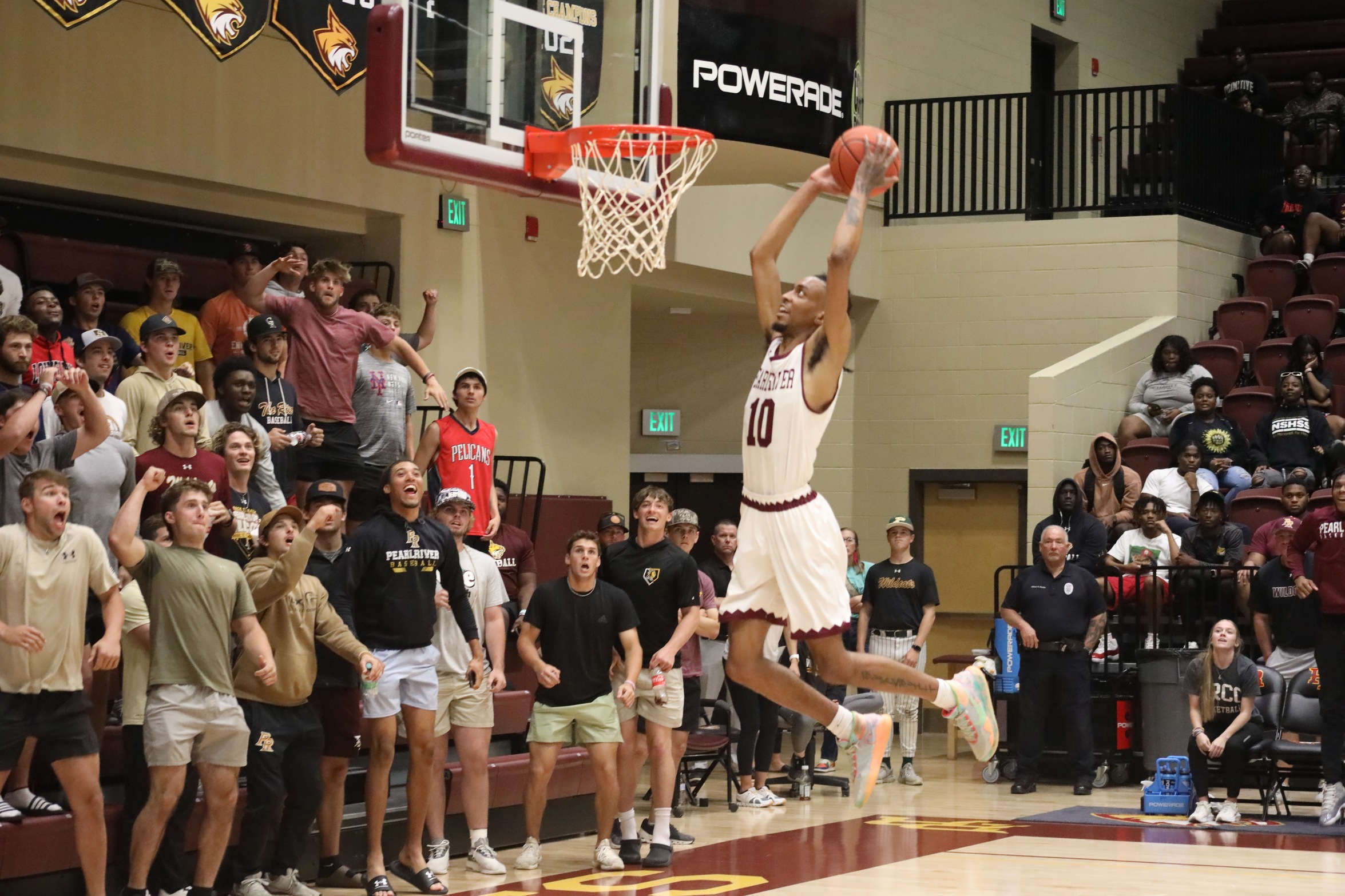 Cam Brown (Hattiesburg) throws down a two-handed slam in PRCC's Region 23 Tournament game against East Central (Trenton Gascho)