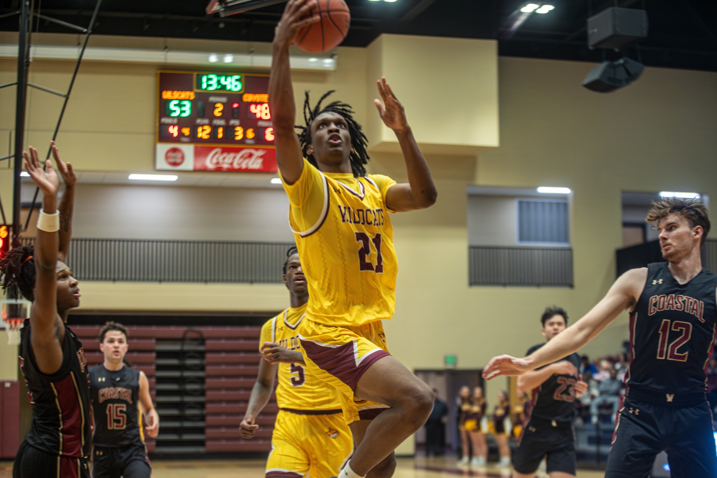 Kedrick Osby (Moss Point) takes the ball to the basket against Coastal Alabama - South (Sultan Seales/PRCC Athletics).