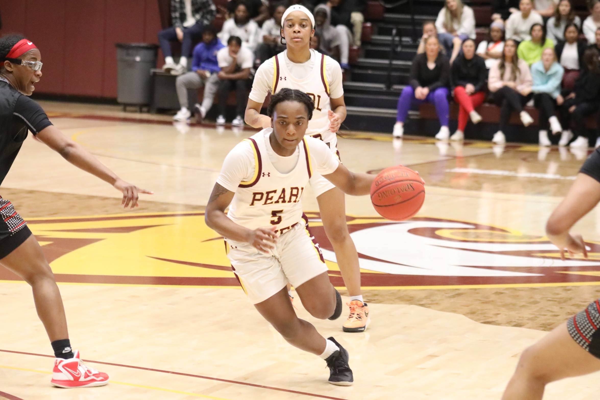 Pearl River women secure first round bye with road victory